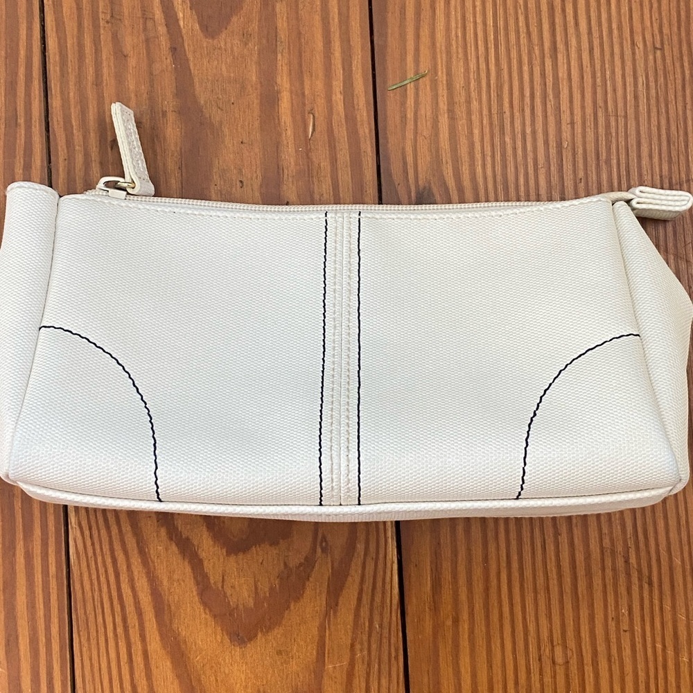 GUERLAIN Elegant Cream Cosmetic Bag with Blue Accents